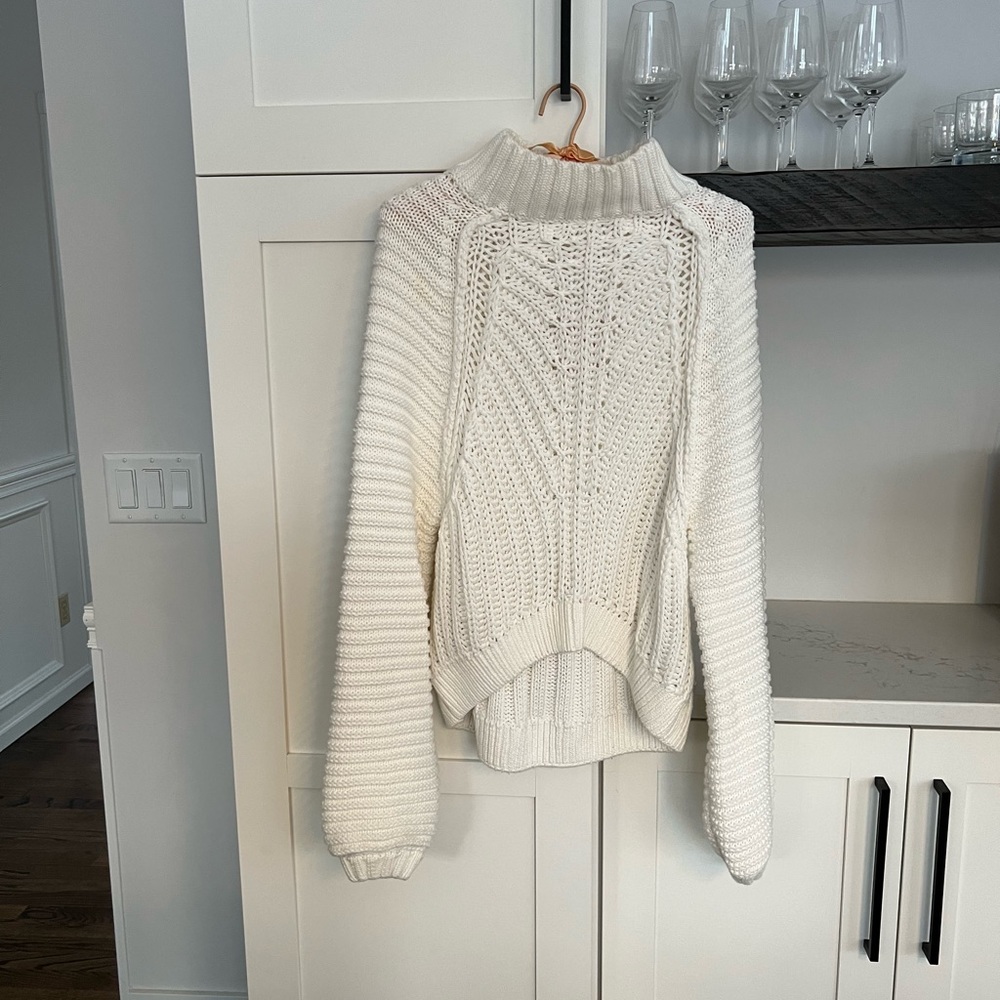 Size small free people sweater. Only worn once for photo shoot with tags.
